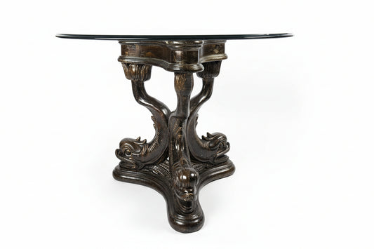 Glass table with dolphin pedestal