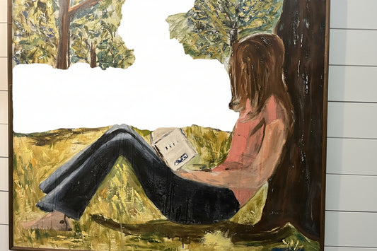 Enjoying a good book in spring against my favorite tree on canvas